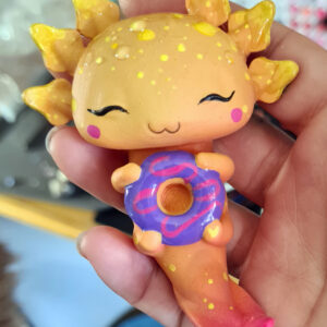 Sunset Axolotl mit lila Donut